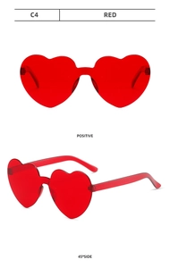 Front and 45-degree side view of translucent red heart-shaped rimless sunglasses