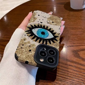 Protective iPhone case with Evil Eye embroidery pattern and golden sequins finish