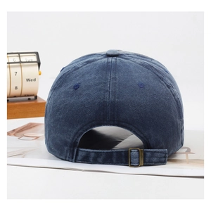 Detail of vintage navy denim baseball cap back view with adjustable metal buckle strap