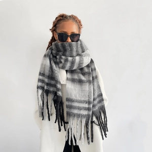 Classic black and white plaid mohair scarf with long tassels and thick warm texture