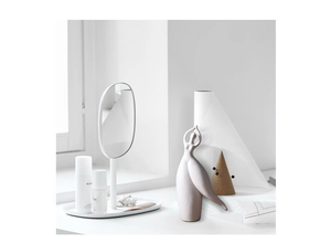 Artistic modern ceramic figurine depicting an elegant yoga pose for home decor