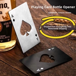 Close-up of Ace of Spades card bottle openers in black and silver finishes on wood
