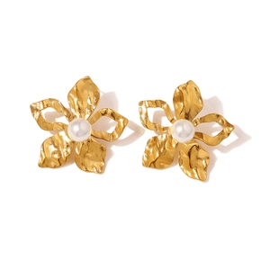 Elegant 18K gold plated flower earrings with pearl centers on a clean white background