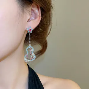 Elegante Ohrringe mit Blumen- und Flaschenkürbis-Design, Zirkonia und Quasten