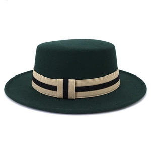 Dark green wool felt boater hat with a striped ribbon band in a classic vintage style