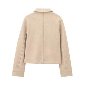 Back view of a minimalist oatmeal-colored short wool jacket with a central vertical seam