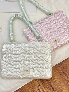 Quilted heart laptop sleeve in silver and pink with comfortable green top handle