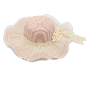 Pink straw sun hat for women featuring mesh ruffles and a delicate lace bow decoration