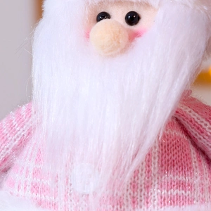 Pink sitting Santa Claus plush with sequins and knitted details for Christmas decor