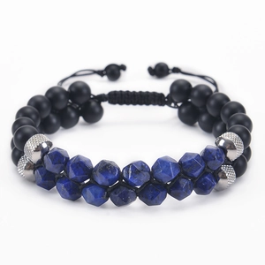 Close-up of double-layer woven bracelet with blue faceted stones and black matte beads
