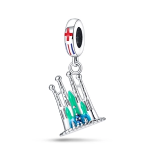 Detailed silver Sagrada Familia pendant with colorful enamel accents on white background