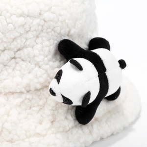 Close-up of white fleece bucket hat featuring a cute 3D plush panda decorative ornament