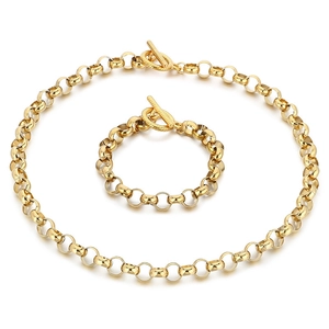 Golden titanium steel jewelry set featuring 10mm pearl necklace and bracelet with OT toggle