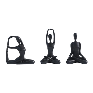 Minimalist black ceramic yoga girl statues in three different meditative poses