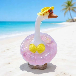 Detail of 23 inch porch goose in yellow polka dot bikini with sun hat and pink swim ring