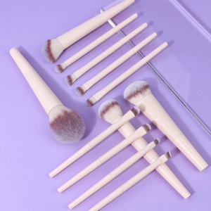 10-piece professional makeup brush set with soft gradient bristles on purple background