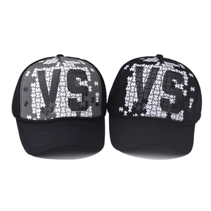 Mesh trucker hat with VS puzzle print design and breathable mesh backing in gray and black