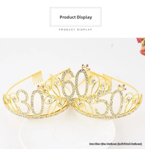 Detail of gold birthday crowns with 30, 50, and 60 rhinestones on a white ceramic plate