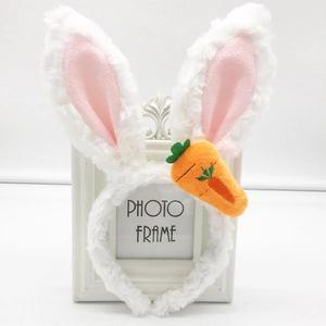 Cute plush bunny ears headband in white and pink with a carrot detail for parties