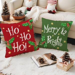 Christmas pillow covers with red truck and holiday text on a cozy white rug