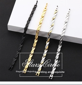 Macro detail of four men's braided titanium steel bracelets in black, gold, and silver