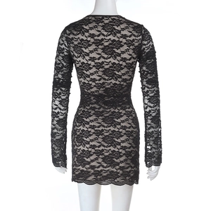 Back view of a sexy black lace mini dress with flared long sleeves and scalloped hemline