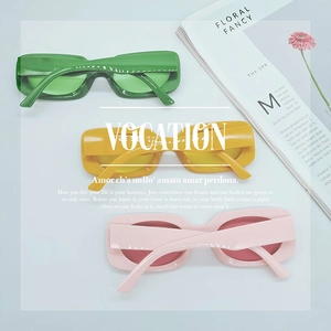 Vintage oval square frame sunglasses in vibrant green, yellow, and pink candy colors