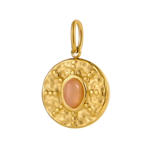 Detail of round golden pendant featuring hammered texture and oval pink-orange stone