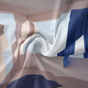 Close-up of abstract geometric print fabric with pleated texture and soft blue tones