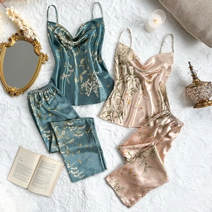 Floral satin pajama set with camisole and long pants in elegant teal and champagne silk finish