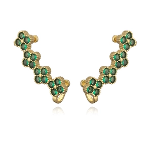 Elegant gold clover ear climbers with vibrant green crystals on a white background