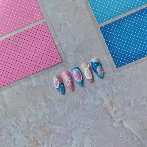 Vintage embossed nail stickers with rose patterns and 3D bow designs in pastel colors