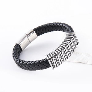 Minimalist woven black leather bracelet with silver stainless steel magnetic clasp