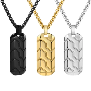 Three men's stainless steel dog tag necklaces in matte black, gold, and polished silver