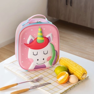 Close-up of pink 3D unicorn lunch bag with smooth metal zippers and blue handle
