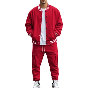 Detail of red stand collar baseball jacket with snap buttons and matching cargo joggers