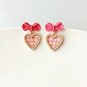 Pink bow heart earrings with gingham fabric and pearl trim in gold settings