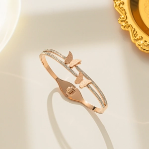 Minimalist rose gold double butterfly bangle with sparkling crystal pave setting