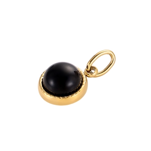 Detail of round black stone pendant with gold rope-textured edge and vintage design