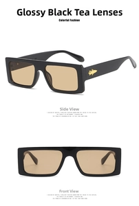 Detailansicht der quadratischen schwarzen Sonnenbrille mit goldenem Raketenmetall-Dekor