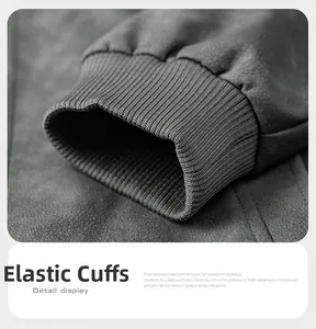Detailed close-up of charcoal grey elastic ribbed cuffs on a vintage leather jacket