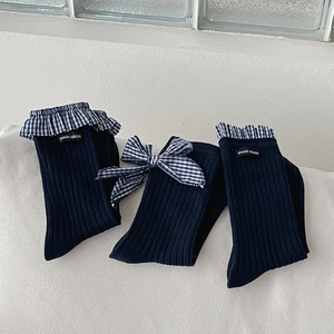 Dark blue lace socks with blue plaid ruffles and bow in preppy Japanese style