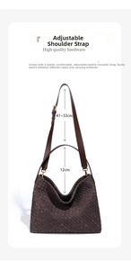 Detail showing woven texture and adjustable shoulder strap on a dark brown leather Hobo bag