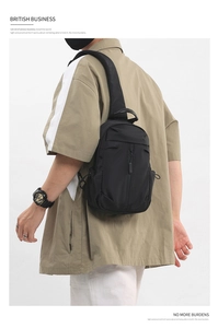 Close-up of black oxford fabric cross-body chest bag for men with waterproof zippers