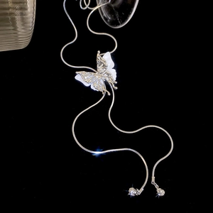 Elegant silver double-layered butterfly tassel necklace with snake chain and sparkle effect