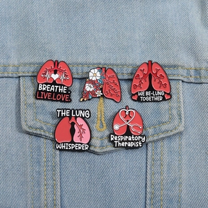 Five-piece respiratory therapist lung enamel pins set on blue denim jacket