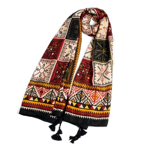 Ethnic style geometric patterned sun protection shawl with tassels on white background