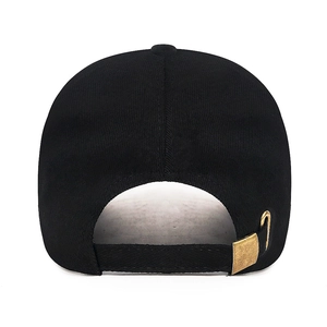 Black cotton baseball cap featuring an adjustable back strap with a vintage bronze metal buckle