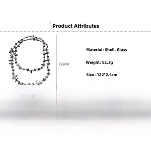 Detailed view of long beaded necklace with shell fragments and glass beads 122cm long