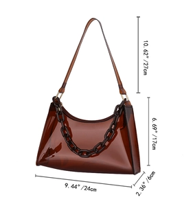 Detailed size chart for brown transparent PVC underarm bag with resin chain details